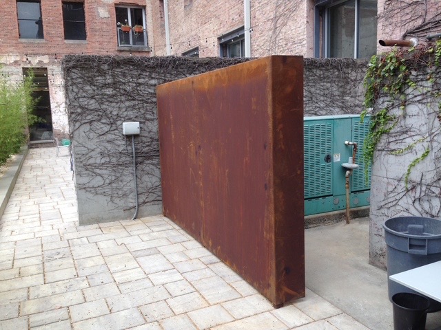 Corten Steel Wall & Paver Courtyard